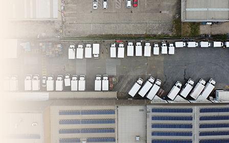 Aerial view of refrigerated delivery trucks at a distribution centre